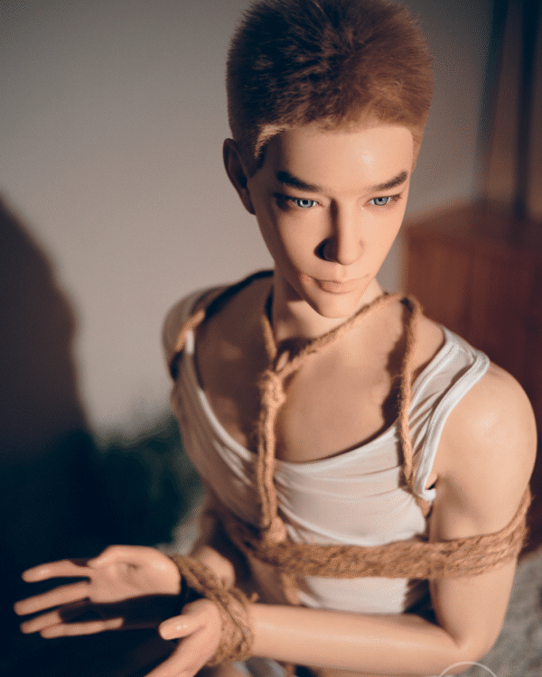 Mendolls realistic gay silicone sex doll Ryan, hyper-realistic, in a sultry LGBT unboxing moment.