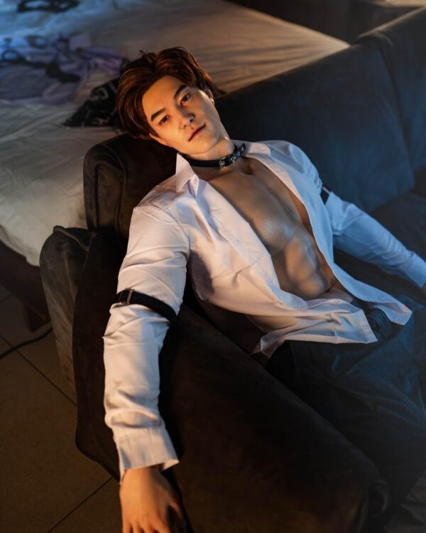 Mendolls silicone boyfriend doll gay, flexible and smooth, showcased in a passionate urban gay romance.