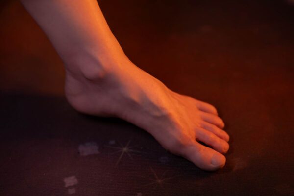 Handcrafted Gay Silicone Doll for Intimacy from Mendolls, glowing in a bold LGBT intimate lifestyle photo shoot.
