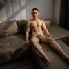 Handcrafted realistic gay doll silicone from Mendolls, glowing with elegance in a vibrant gay love showcase