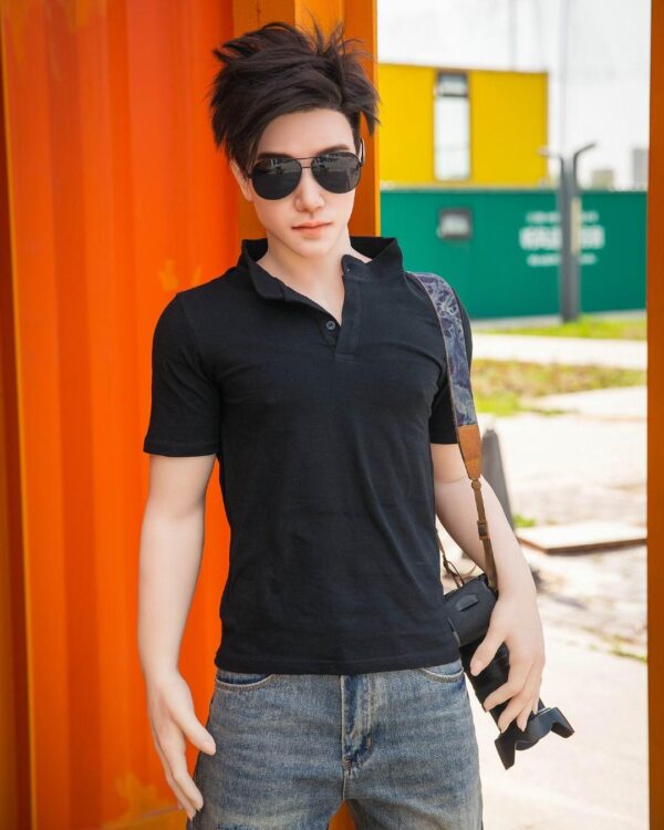 Mendolls gay partner replica doll with flexible elegance, radiant in a vibrant LGBT closeness photo