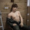 Elegant silicone male doll posing confidently