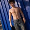 Radiant gay partner replica doll from Mendolls, posed flexibly in a vibrant gay devotion showcase.
