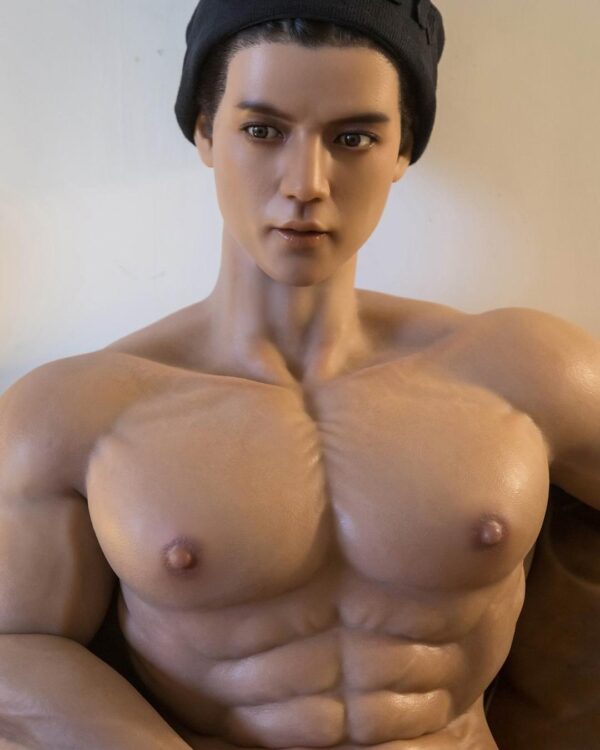 Mendolls muscle male sex doll with hyper-realistic muscles, in a vibrant gay allure display.