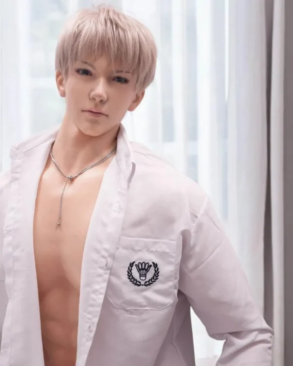 Realistic silicone male doll with anime-inspired features and open white shirt