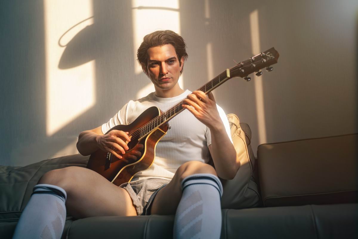 Gay man embracing his silicone doll in a cozy room