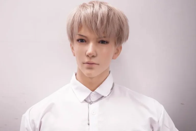 Gay-friendly silicone doll with realistic eyes and clean boyish look