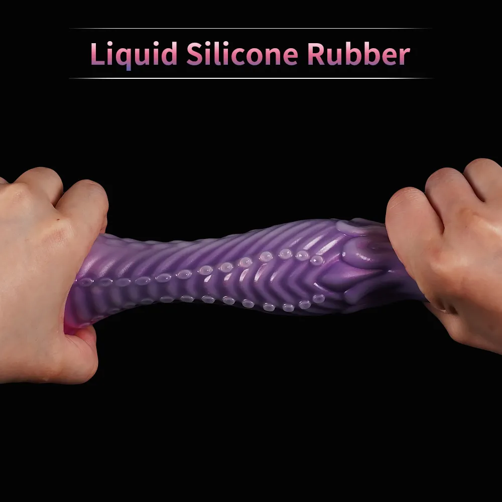 Safe water-based lubricant next to a silicone anal toy