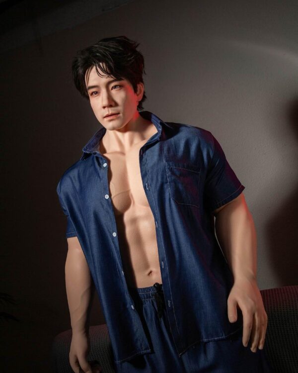 Realistic silicone male doll Joy wearing workout briefs showing well-defined abs