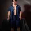 Collectible muscular gay sex doll Joy with bold masculine face and confident gaze