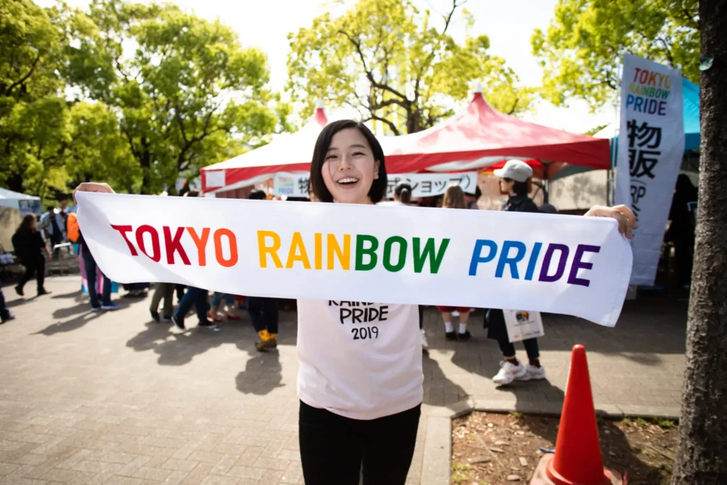 Japanese LGBTQ+ couple celebrating intimacy at Pride